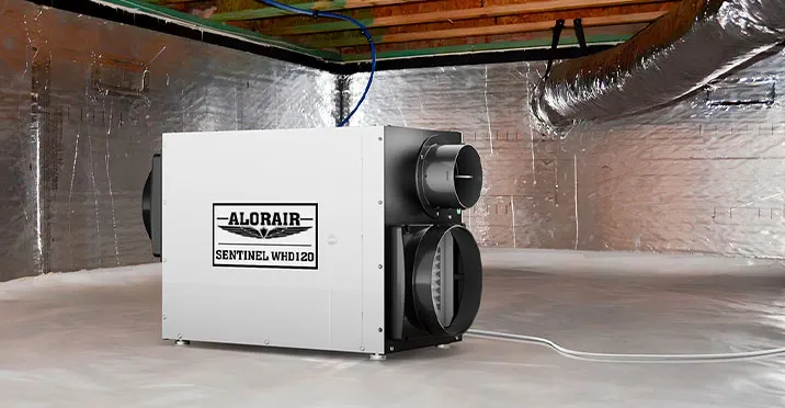 Sentinel WHD 120 dehumidifier installed in residential attic